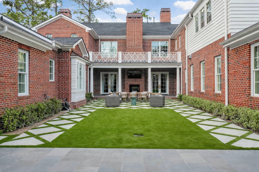 * Diamond-pattern artificial turf installation with clean seams and uniform, professional finish